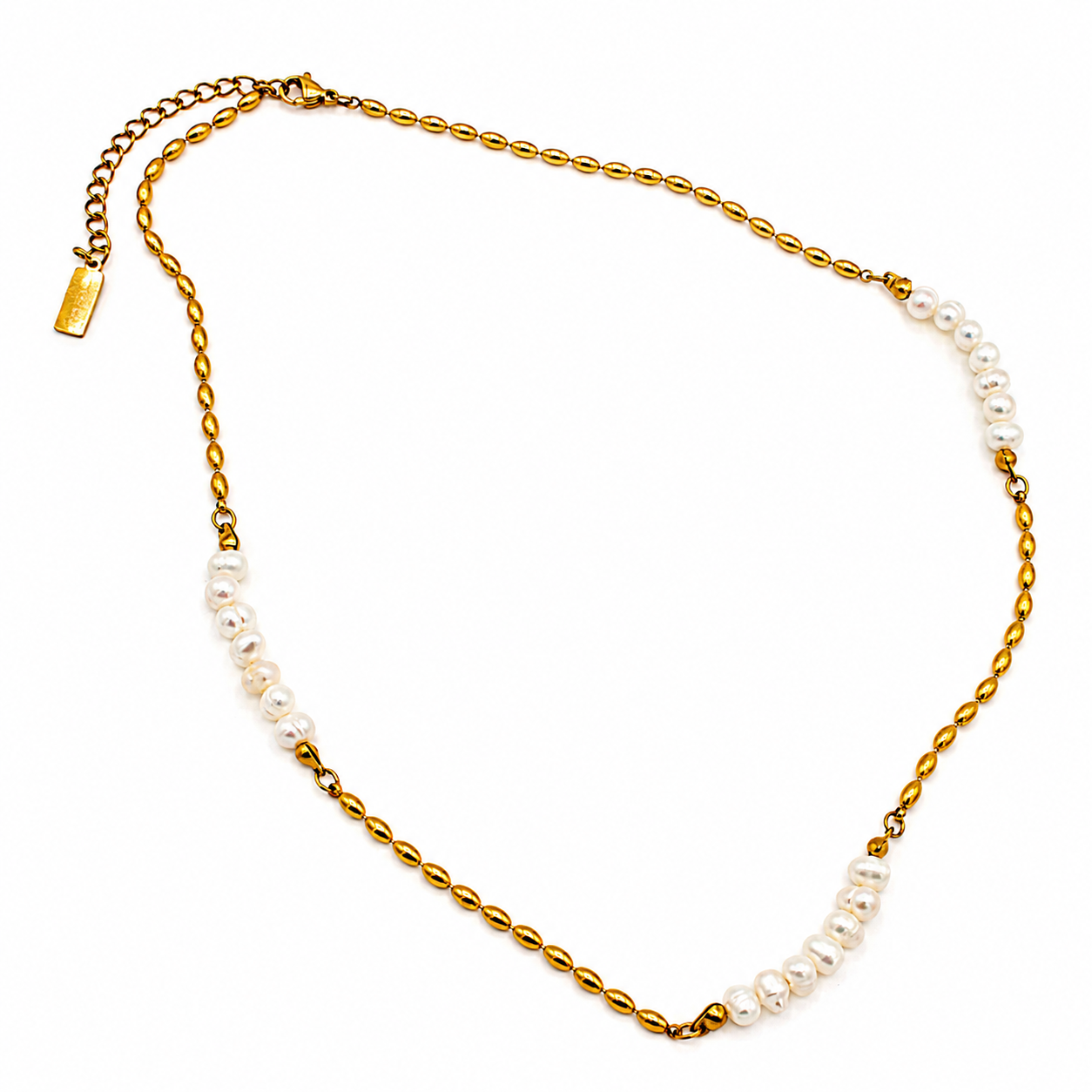 A delicate gold chain necklace featuring two curved rows of small, irregular white freshwater pearls