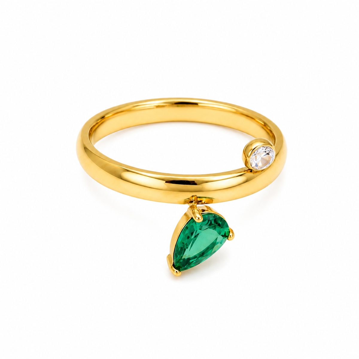 A gold ring featuring a teardrop-shaped green gemstone and a small round clear stone