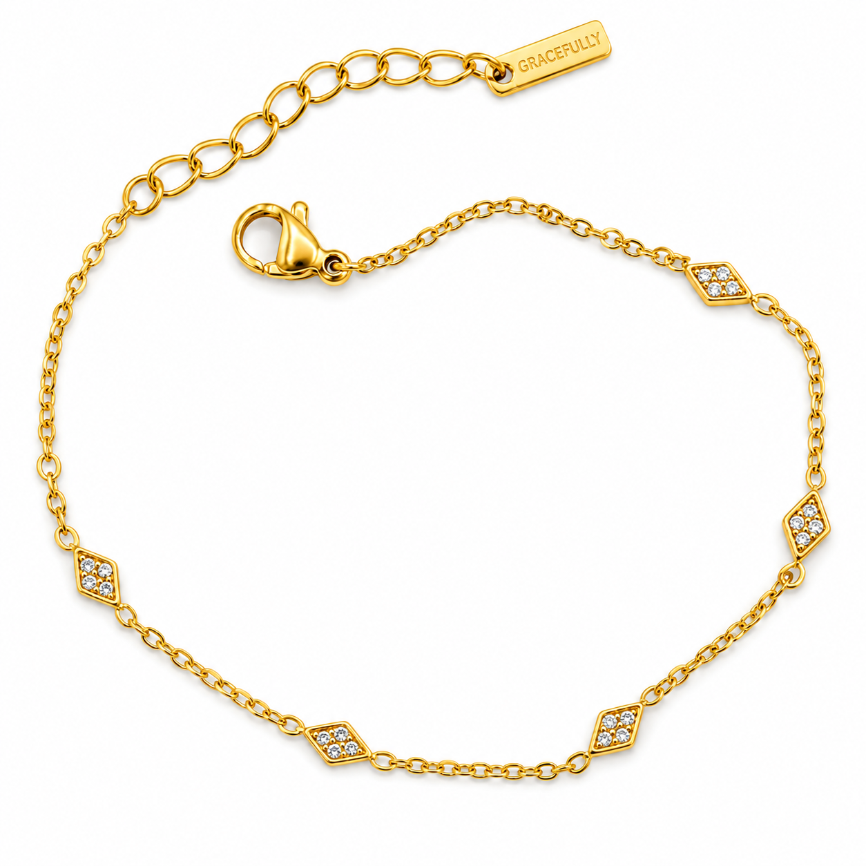 A gold chain anklet with small diamond-shaped pavé accents and an adjustable lobster clasp, shown on a clean white background. The extender chain has a tag engraved with 'GRACEFULLY'.