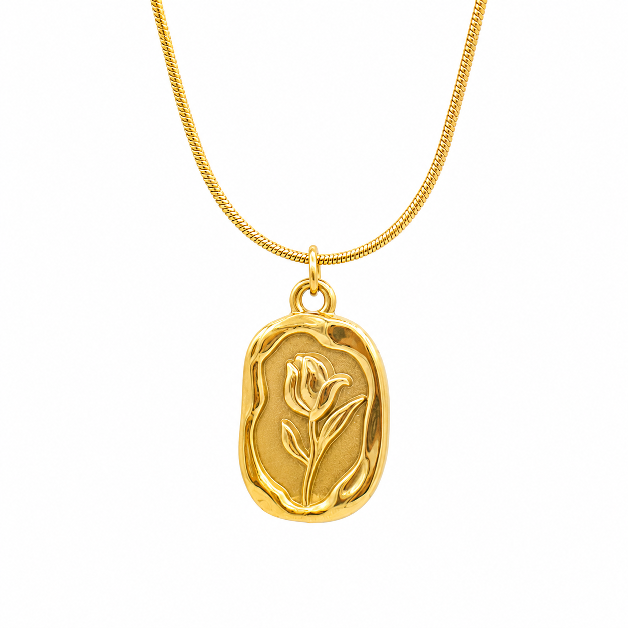 A gold necklace featuring a textured, irregularly shaped oval pendant with an embossed tulip design, suspended from a gold snake chain