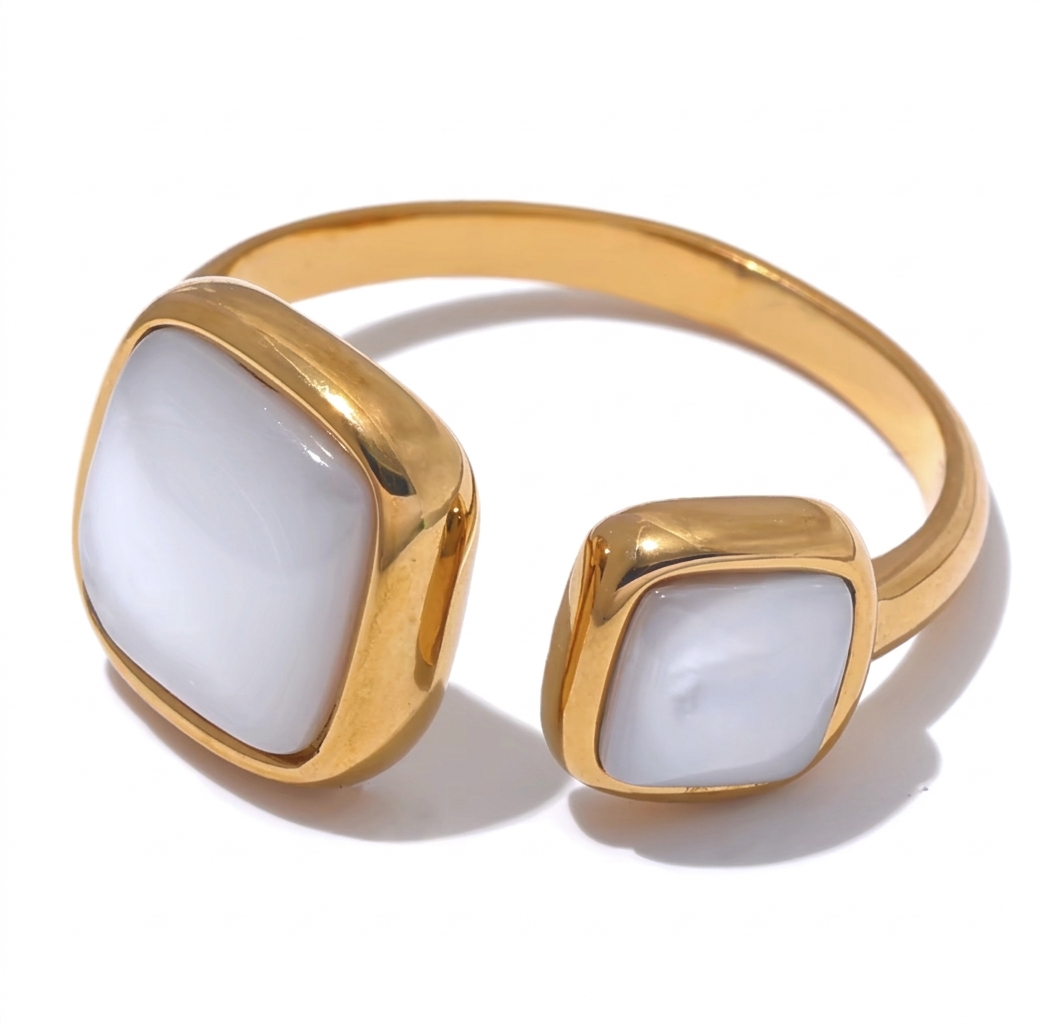 Gold ring with two white pearl stones