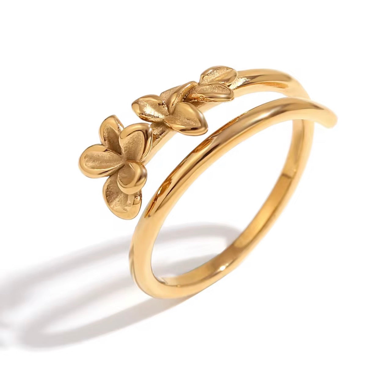 Gold spiral ring with floral design