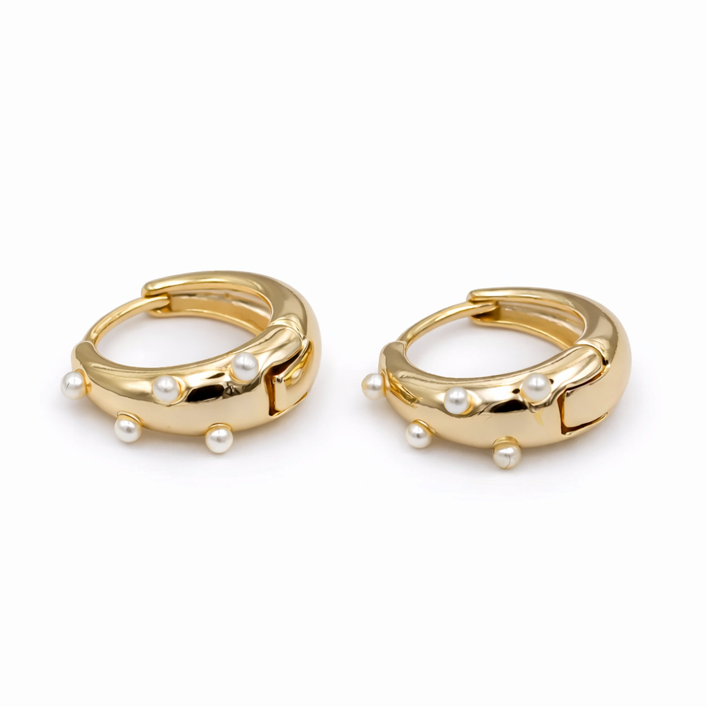 Gold hoop earrings with pearl accents