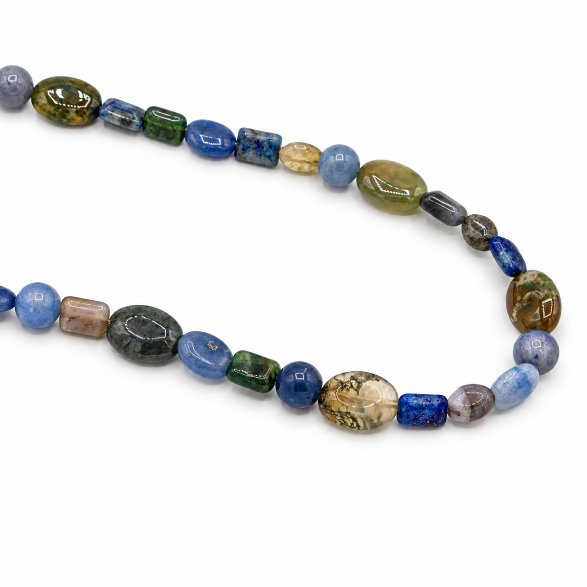 A beaded necklace made of polished natural stone beads in various shapes and colors, including blue, green, brown, and gray.