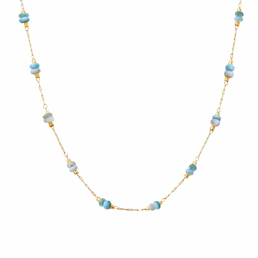 Necklace with gold chain and blue beads