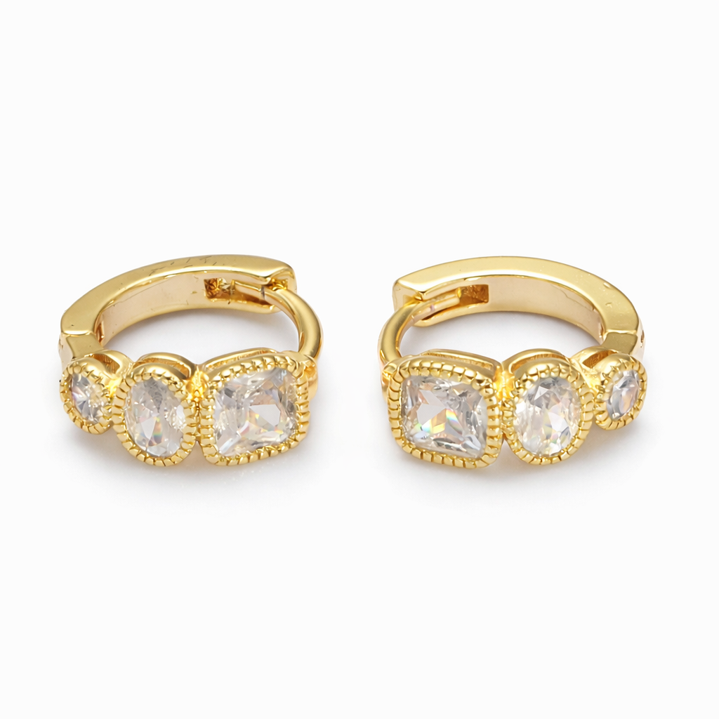 Gold hoop earrings with clear gemstones