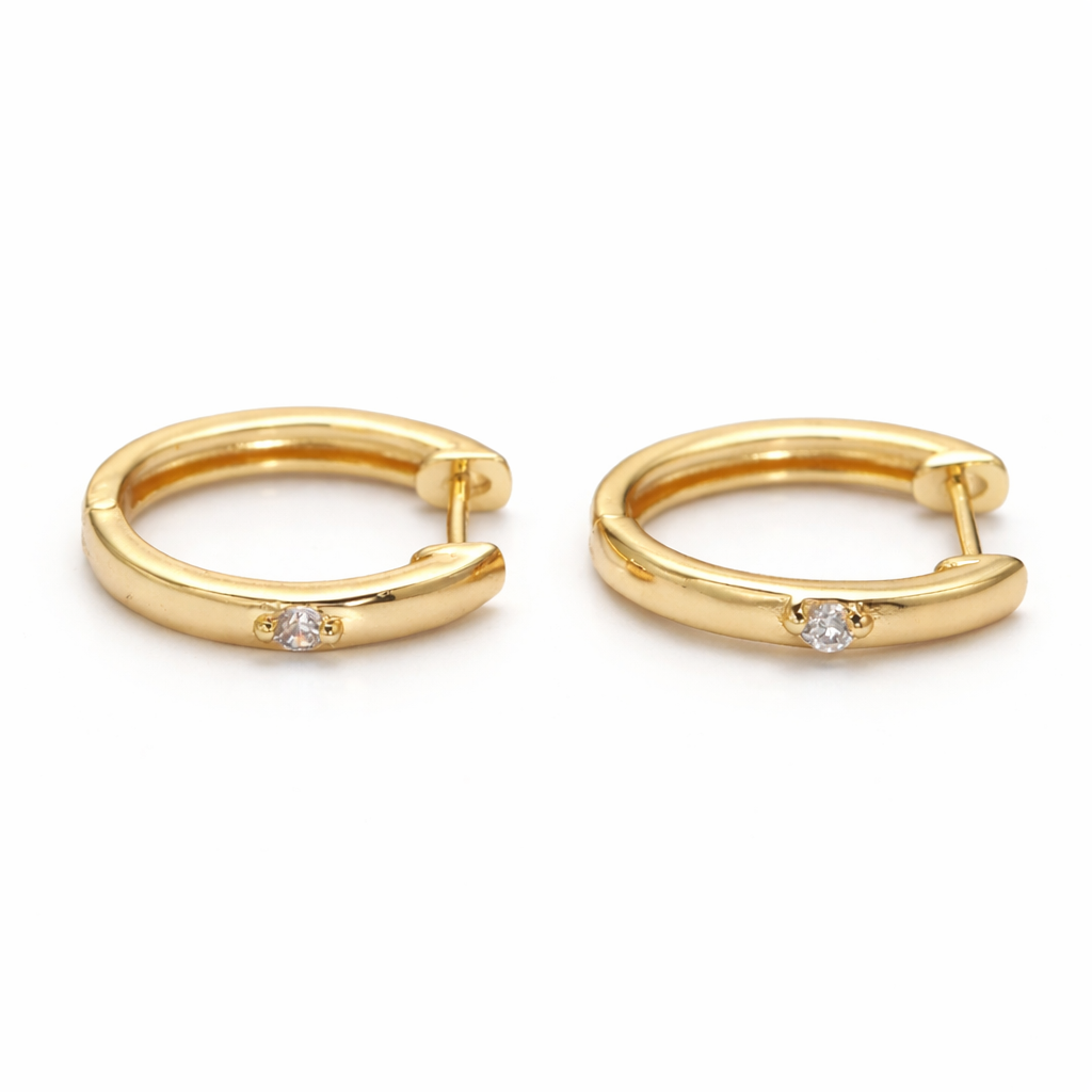 Gold hoop earrings with small diamonds