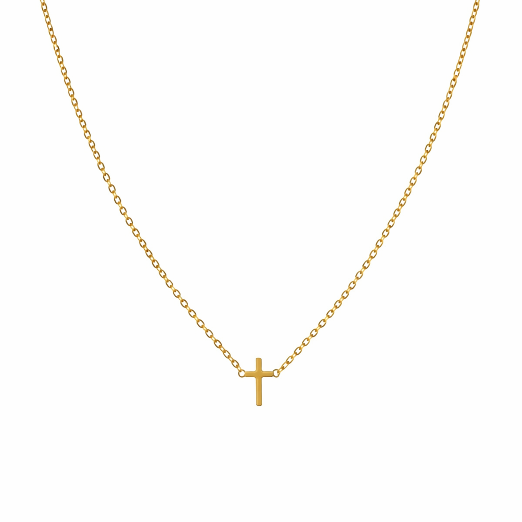 Gold necklace with a small cross pendant