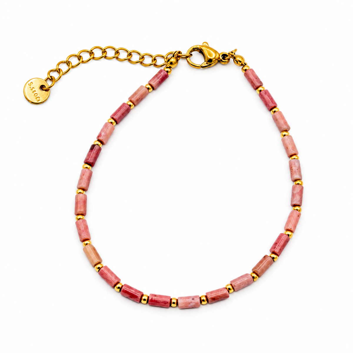 A beaded bracelet featuring chunky pinkish-red cylindrical beads separated by small gold spacers.