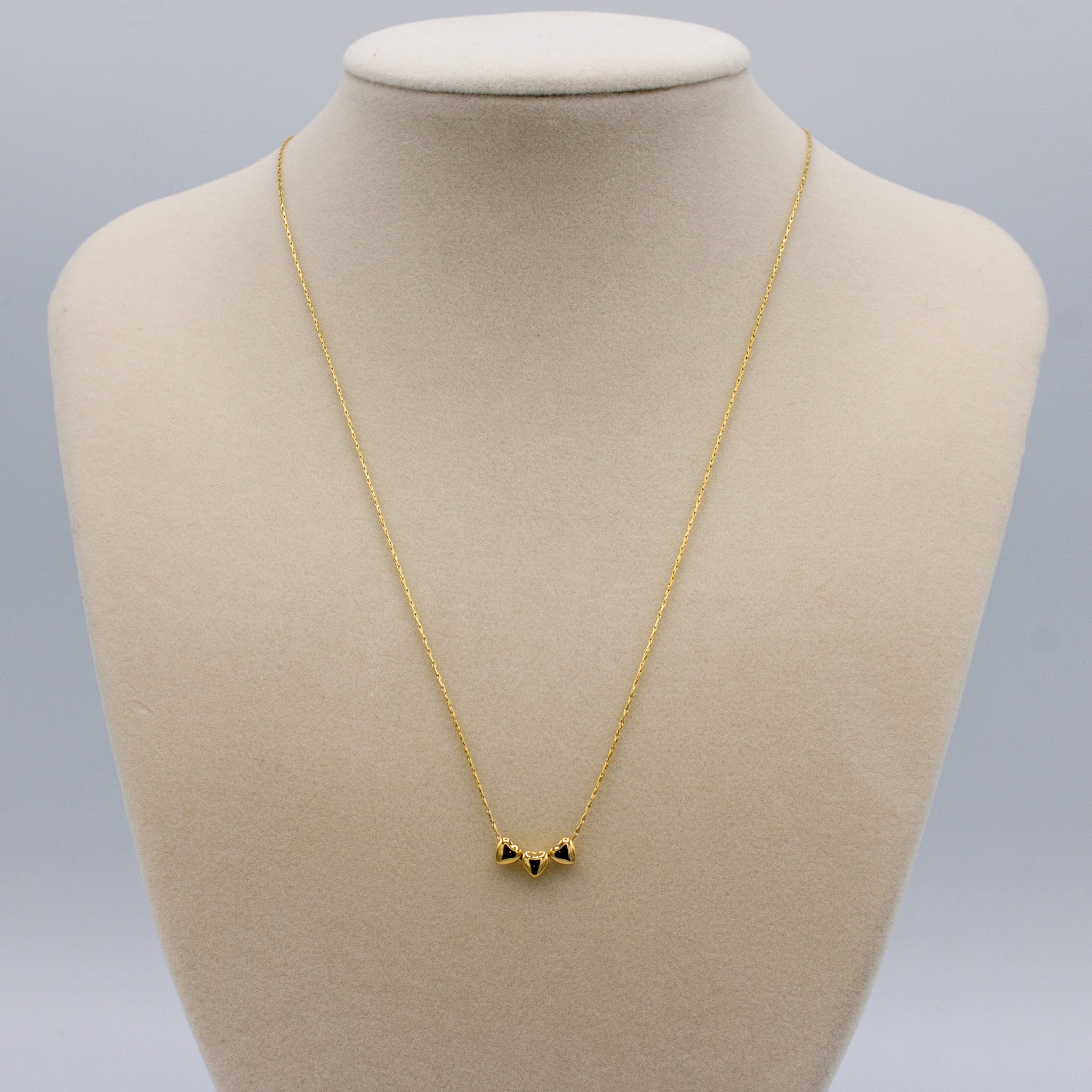 Gold Necklace with 3 dainty golen hearts