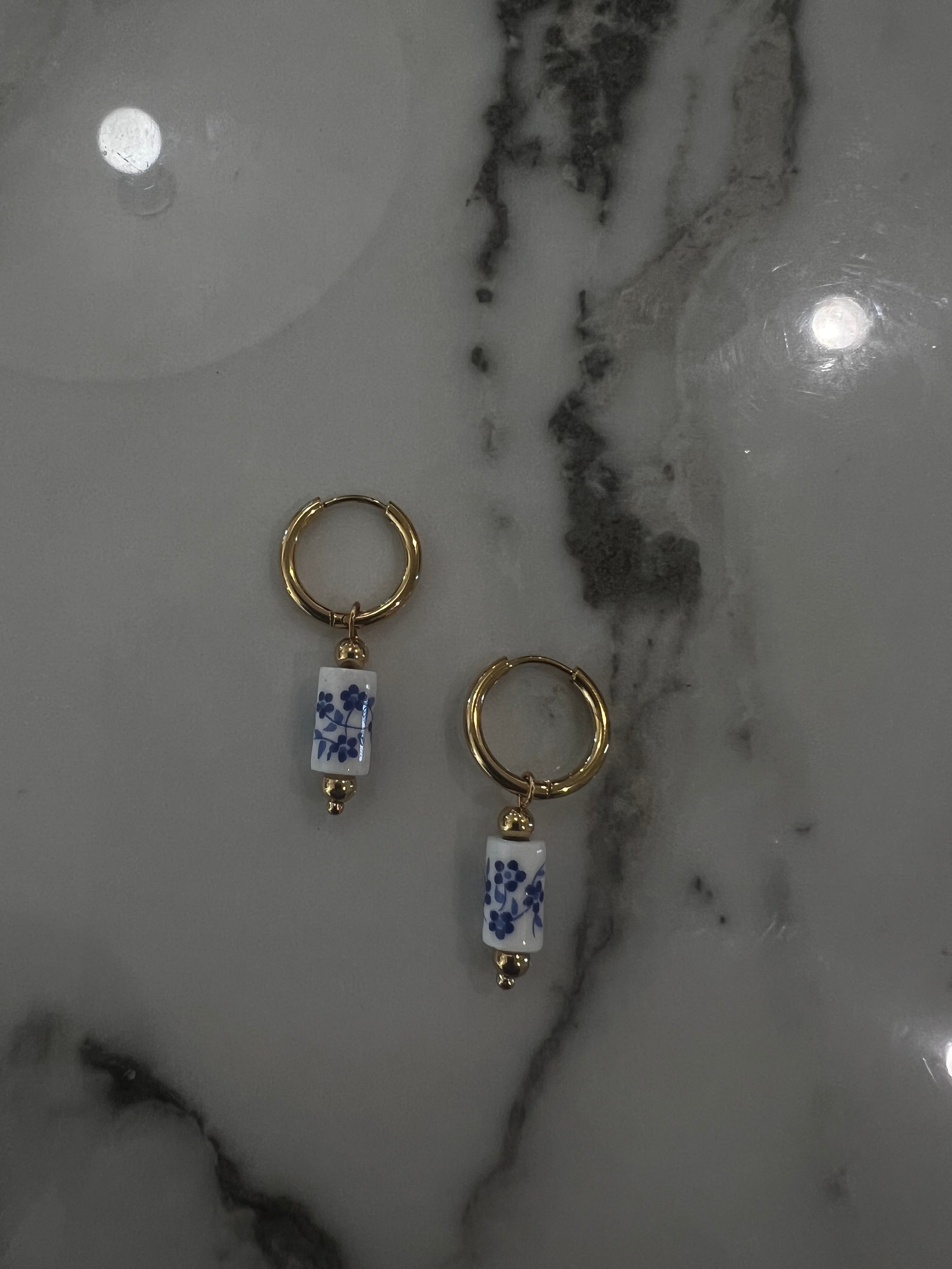 Blue flower dangle earrings