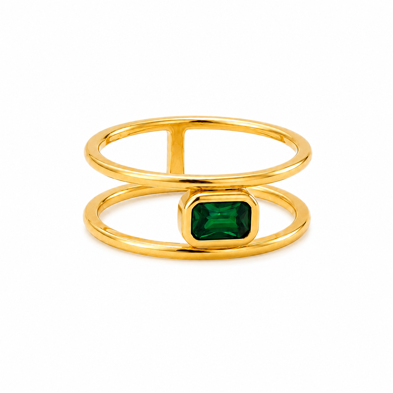 A gold-plated double-band ring featuring a rectangular green emerald-cut gemstone in the center
