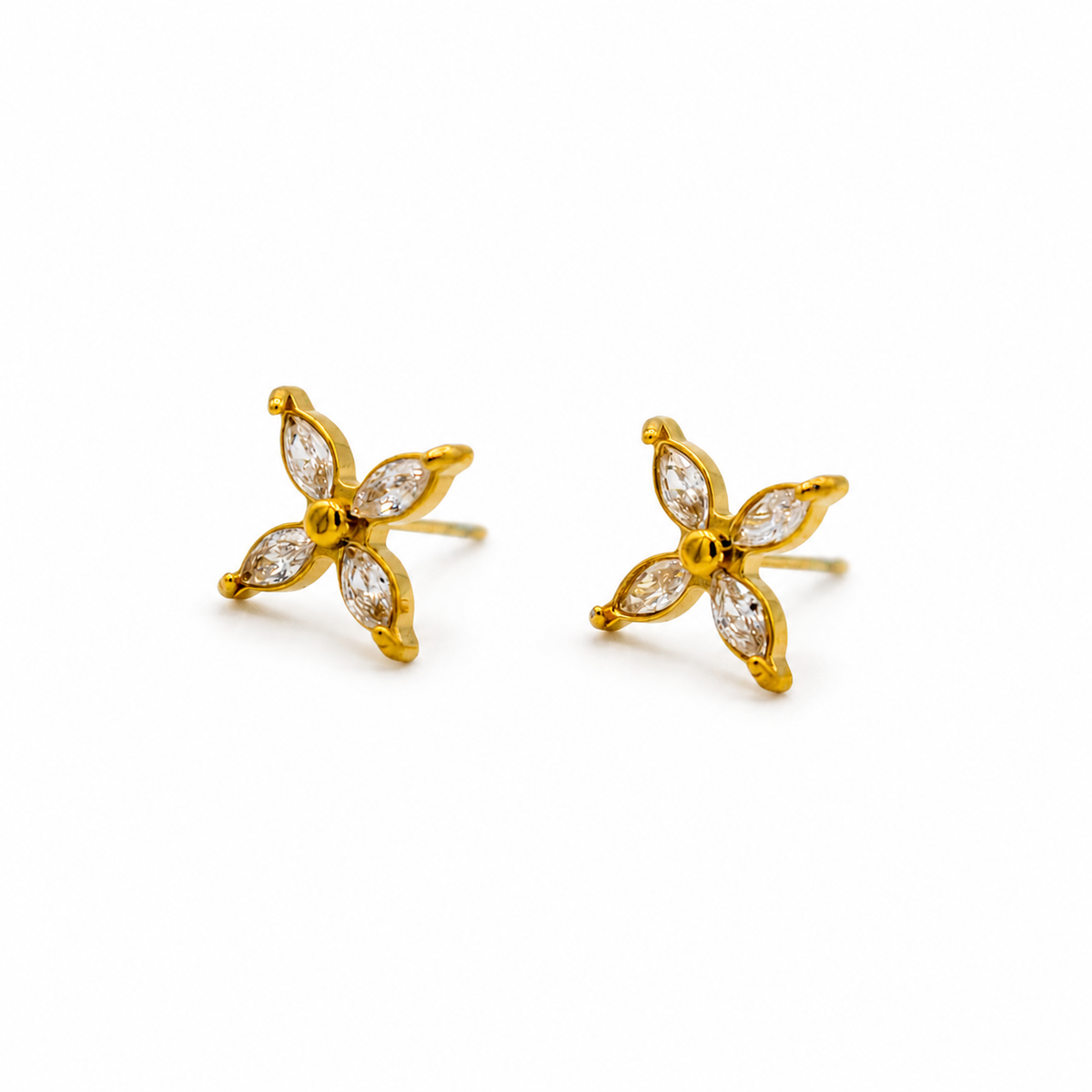 A pair of gold flower stud earrings with marquise-cut clear stones