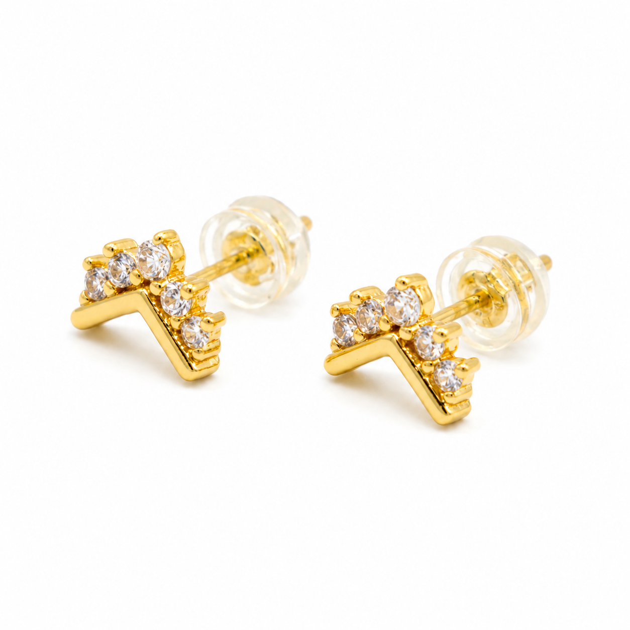 A pair of gold geometric stud earrings with clear gemstones
