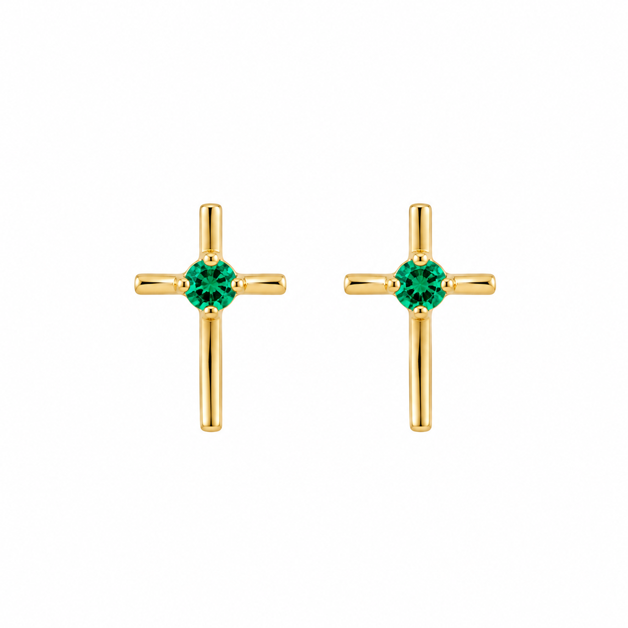 A pair of gold cross stud earrings with a round green gemstone at the center