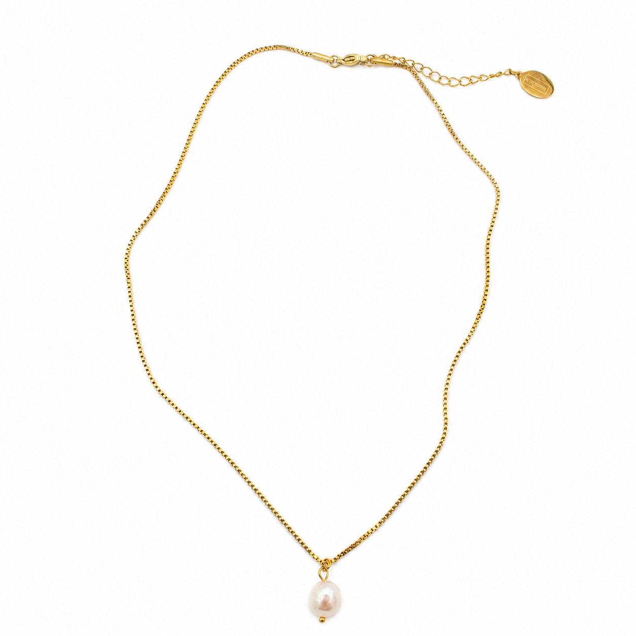 A delicate gold chain necklace featuring a single small, lustrous white pearl pendant