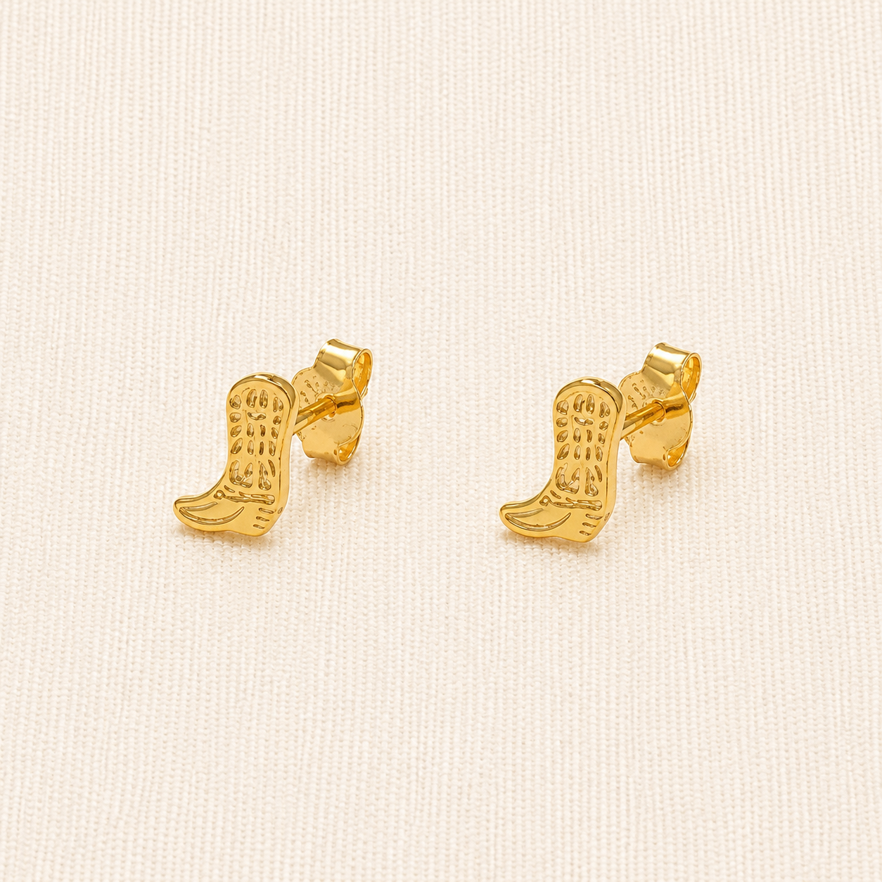 Gold cowboy boot shaped studs