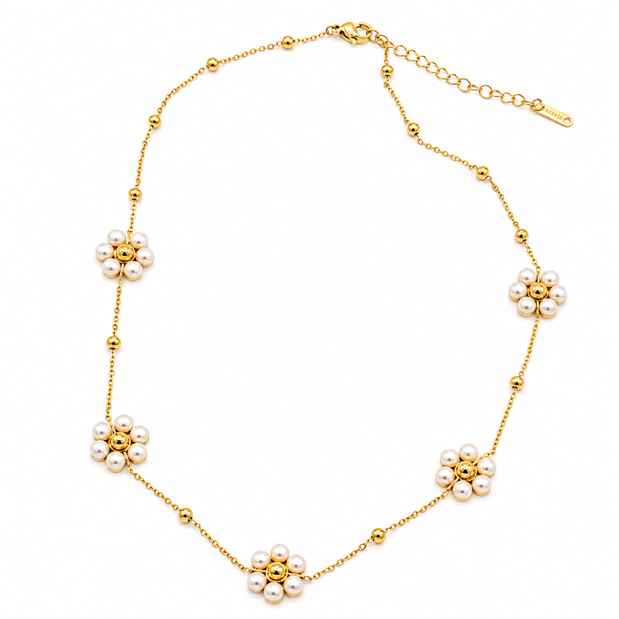 A gold chain necklace featuring five flower motifs made of white pearls and gold beads