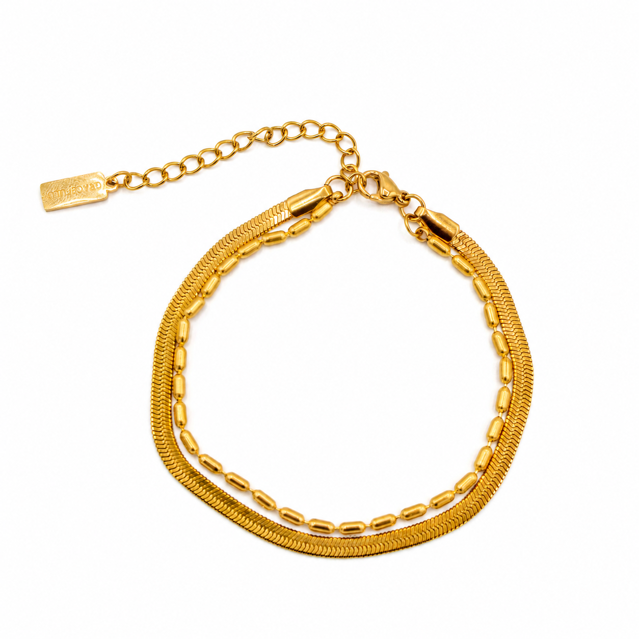 A gold double strand chain bracelet featuring a textured snake chain and a smoother paperclip-style chain, with a lobster clasp and an adjustable extender chain