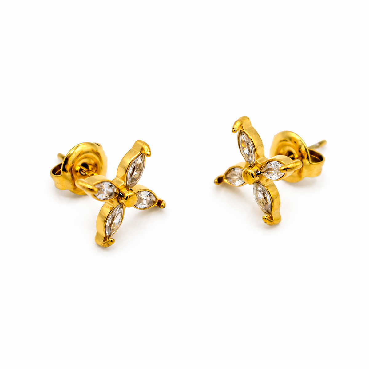 gold stud earrings with marquise-cut clear gemstones arranged in a butterfly-like motif