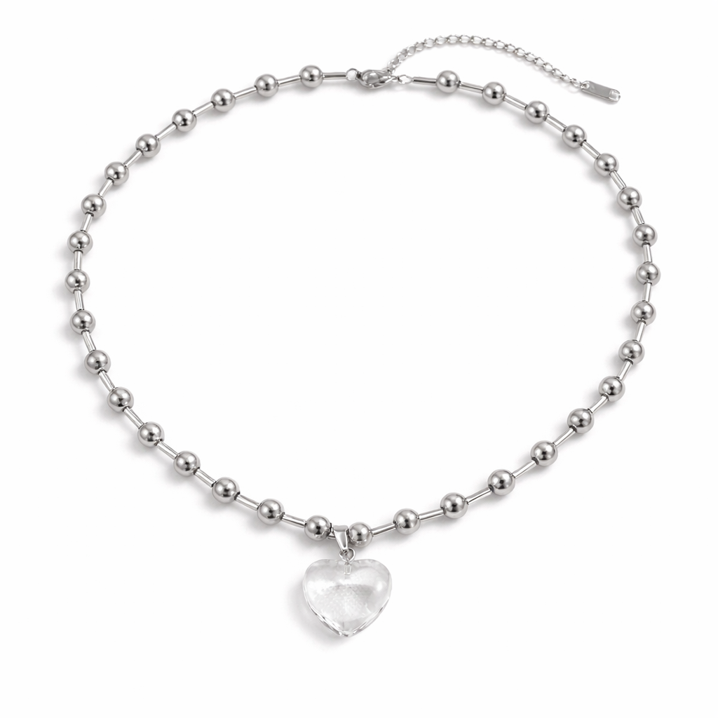 Silver beaded necklace with a heart-shaped pendant