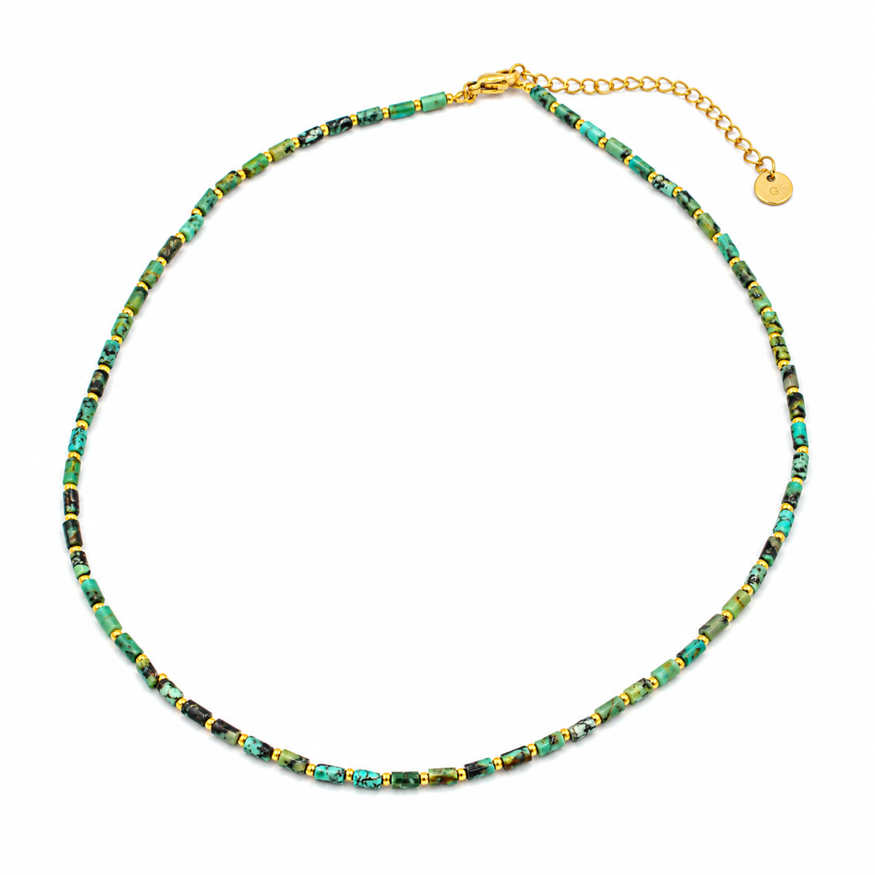 A beaded necklace featuring small green and turquoise-blue beads with gold accents, a gold lobster clasp, and an adjustable gold chain extender with a round tag