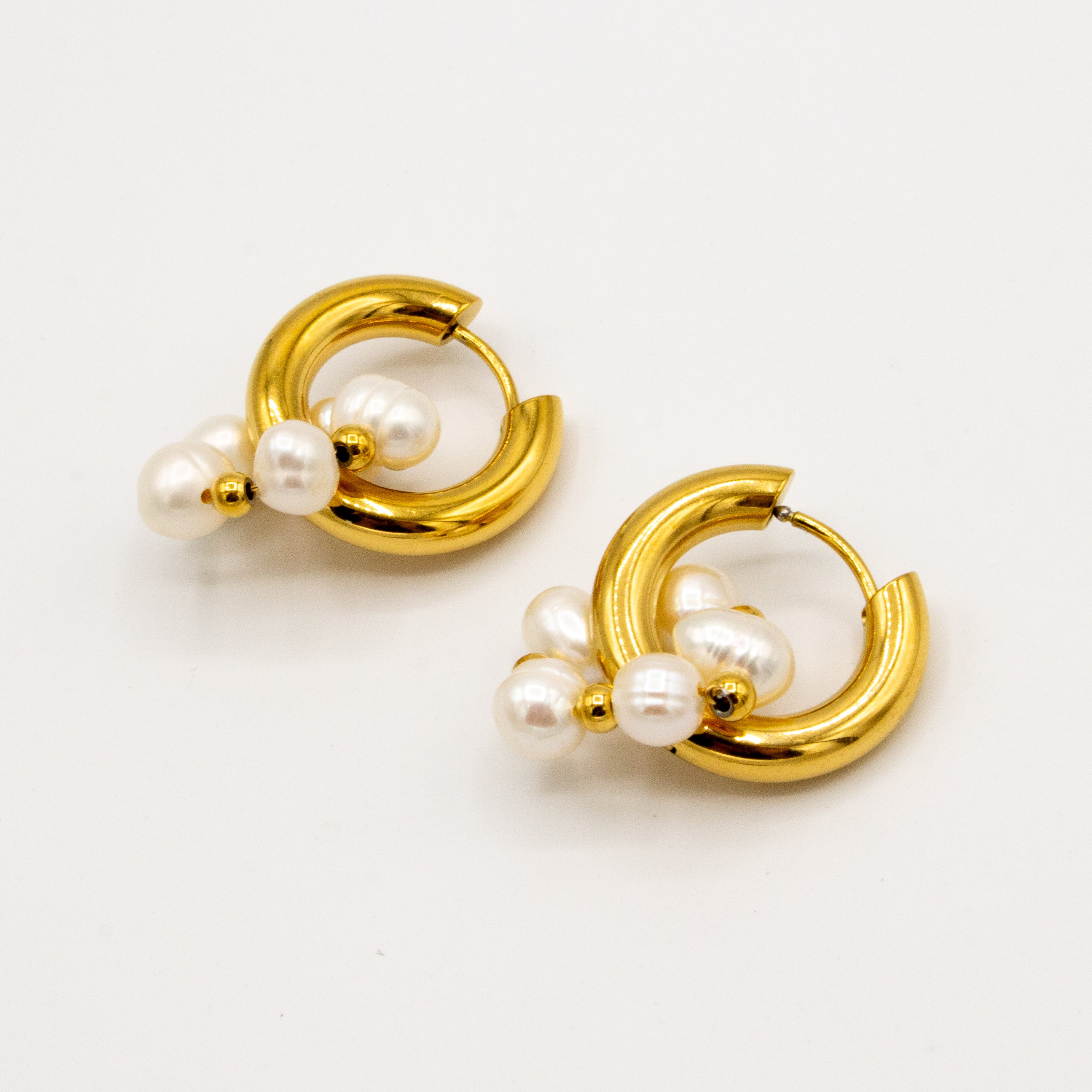 Golden Ring and Pearl Earrings